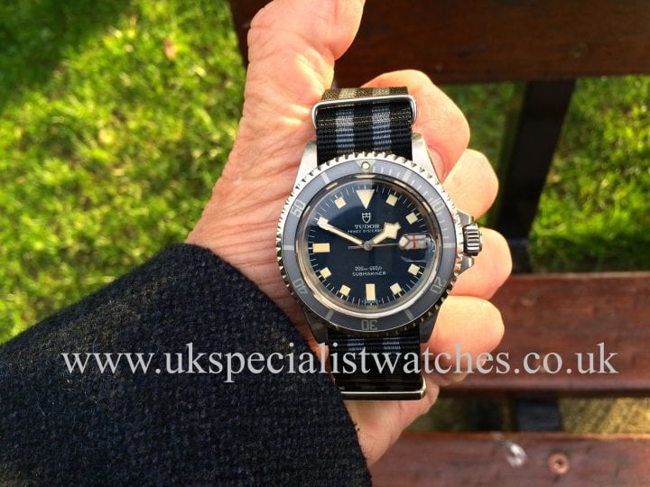 UK Specialist Watches have a 1968 vintageTudor Submariner Snowflake 7021 with the red /black roulette date wheel