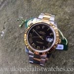 UK Specialist Watches have brand new unworn Rolex Datejust II Gold & Steel - Black Dial - 116333