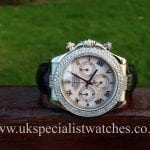 UK Specialist Watches have a white gold Rolex Daytona with silver Mother Of Pearl dial and double diamond bezel.