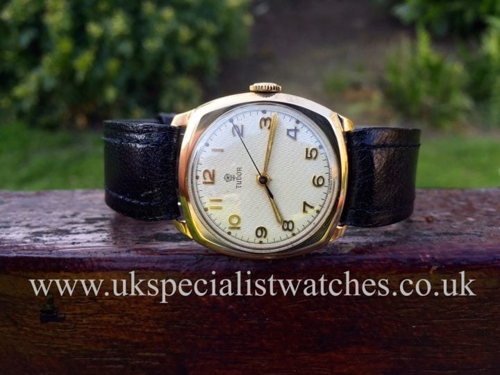 UK Specialist Watches have a beautiful 1940s Vintage Tudor Rolex in stock with a 9k Gold cushion case.