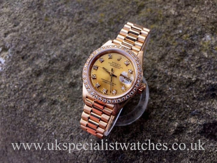 UK Specialist watches have a beautiful 18ct Gold Rolex Lady Date just with Diamond dial and Diamond bezel