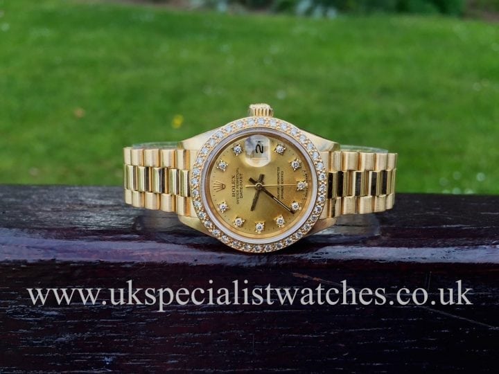 UK Specialist watches have a beautiful 18ct Gold Rolex Lady Date just with Diamond dial and Diamond bezel