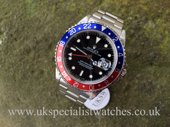 In stock at UK Specialist Watches a mint Rolex GMT Master II Pepsi Bezel 16710 complete full set