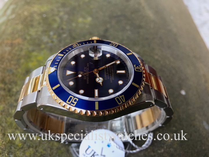 UK Specialist Watches have a beautiful Rolex Submariner 16613 with a blue swiss T 25 dial in 18ct yellow gold and steel