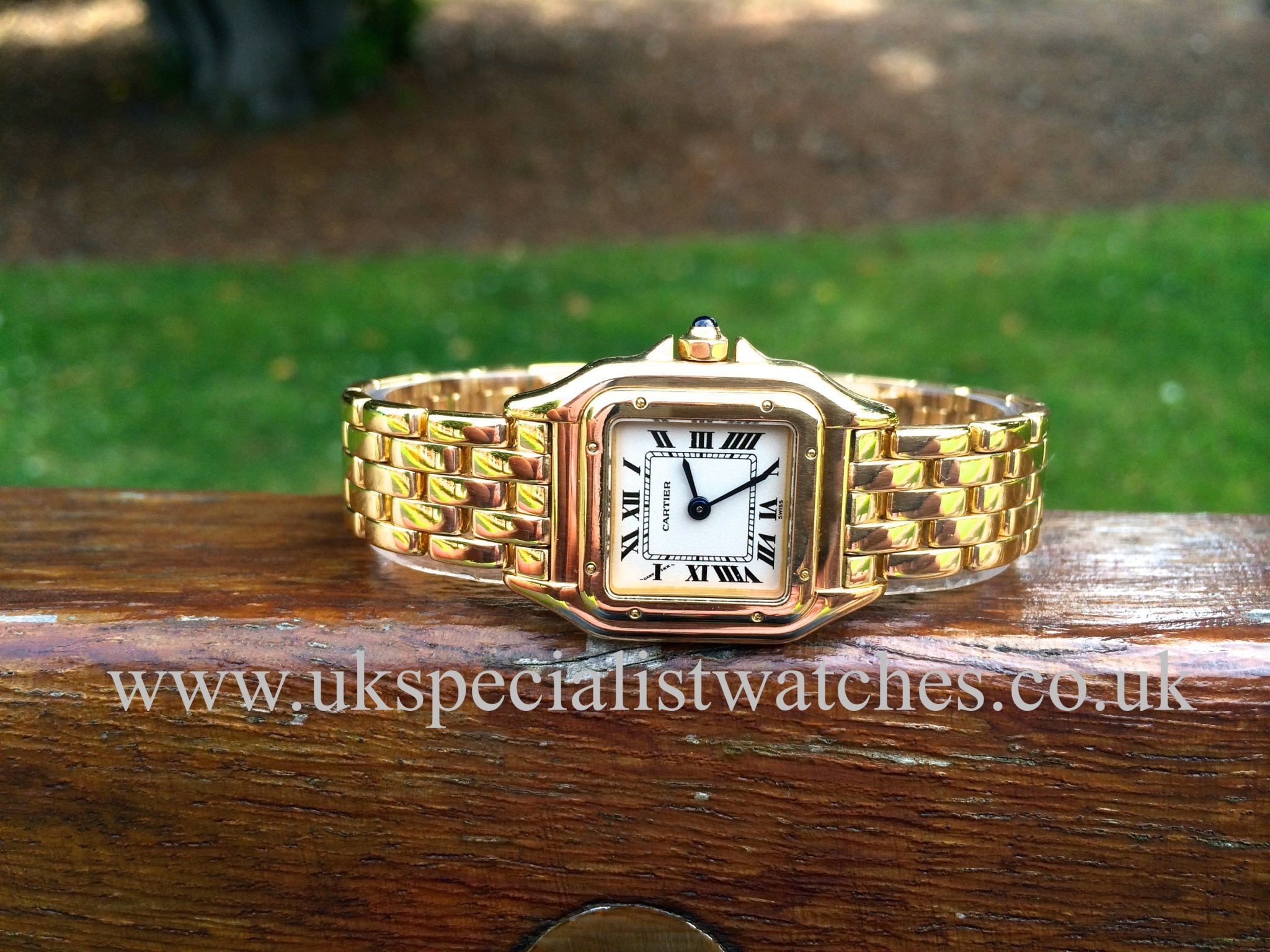 solid gold cartier watch