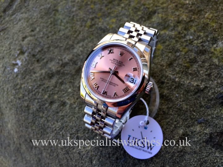 UK Specialist Watches have a 31mm MidSize Datejust in stainless steel with a salmon pink dial.