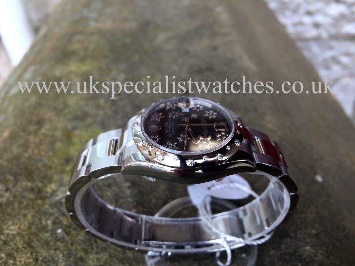 UK Specialist Watches have a Ladies Datejust 31mm midsize with a Rhodium Floral dial and a factory white gold diamond set bezel 178240.