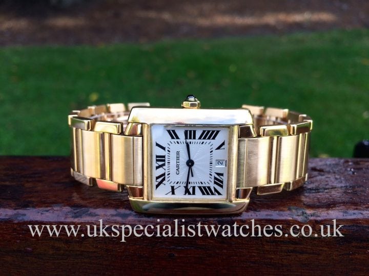 UK Specialist Watches have a stunning Gents Cartier Tank Francaise Automatic 18ct Gold - Ref 1840