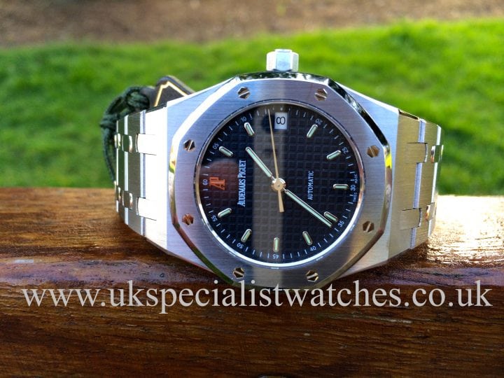 UK Specialist Watches have a Audemars Piguet Royal Oak 37mm 14790ST.OO.0789ST.08 with a navy blue dial, complete with box and papers.