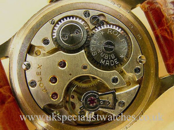 UK Specialist Watches have a beautiful rare Rolex Shock resisting with 9ct Gold dating back to 1949