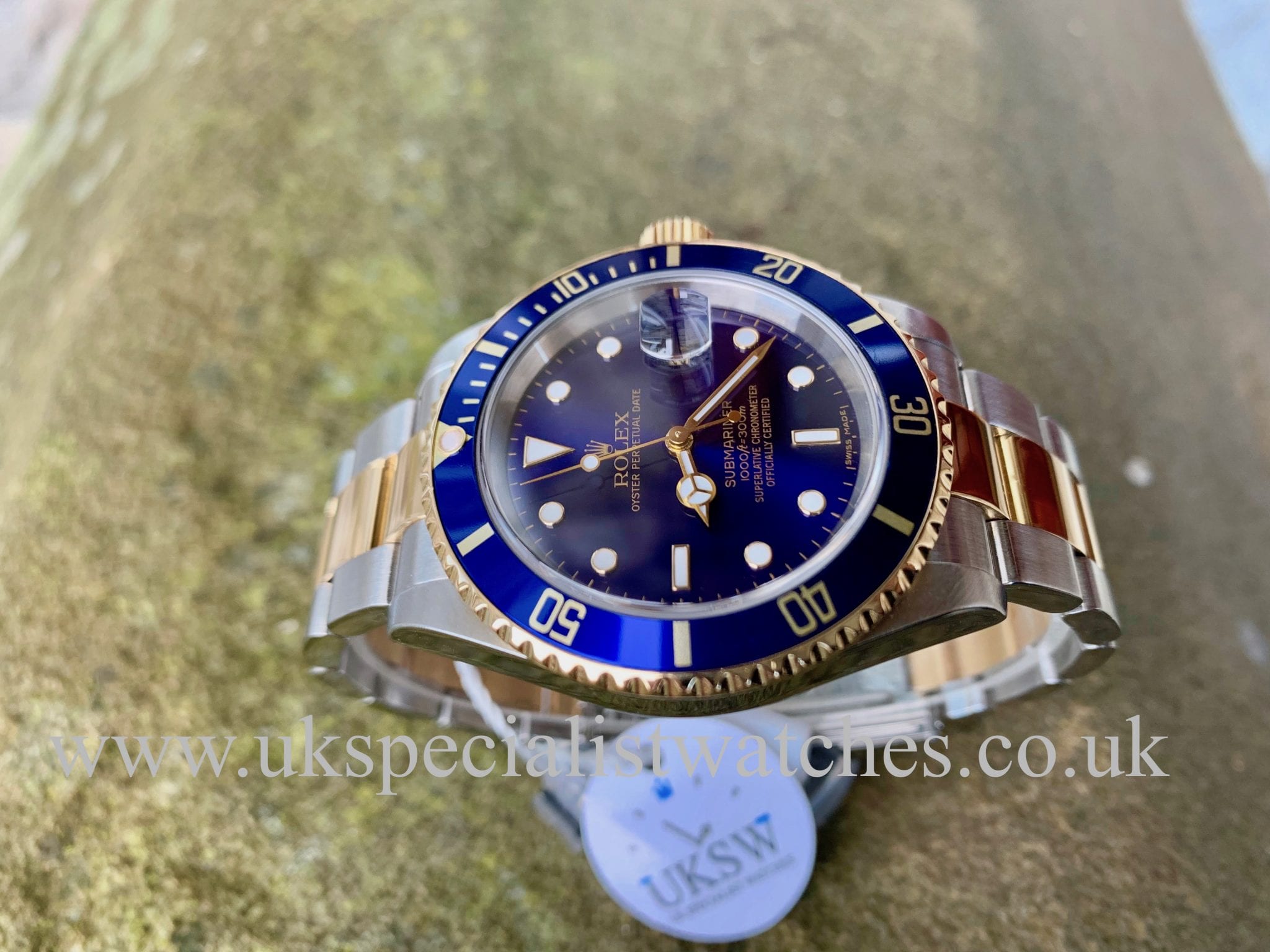 rolex submariner gold blue dial